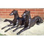 A PAIR OF UNUSUAL HEAVY BRONZE GREYHOUNDS, 4 foot high