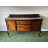 A MID 19TH CENTURY MAHOGANY CABRIOLE LEG BOW FRONTED THREE DRAWER SIDEBOARD, with two cupboards, 5in