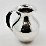 A GEORG JENSEN DANISH SILVER JUG, pattern 385A, made in Copenhagen, circa 1935, 17.7cm high