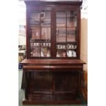 A VERY FINE 19TH CENTURY GLAZED BOOKCASE, two door bookcase, over 2 drawers, supported by turned