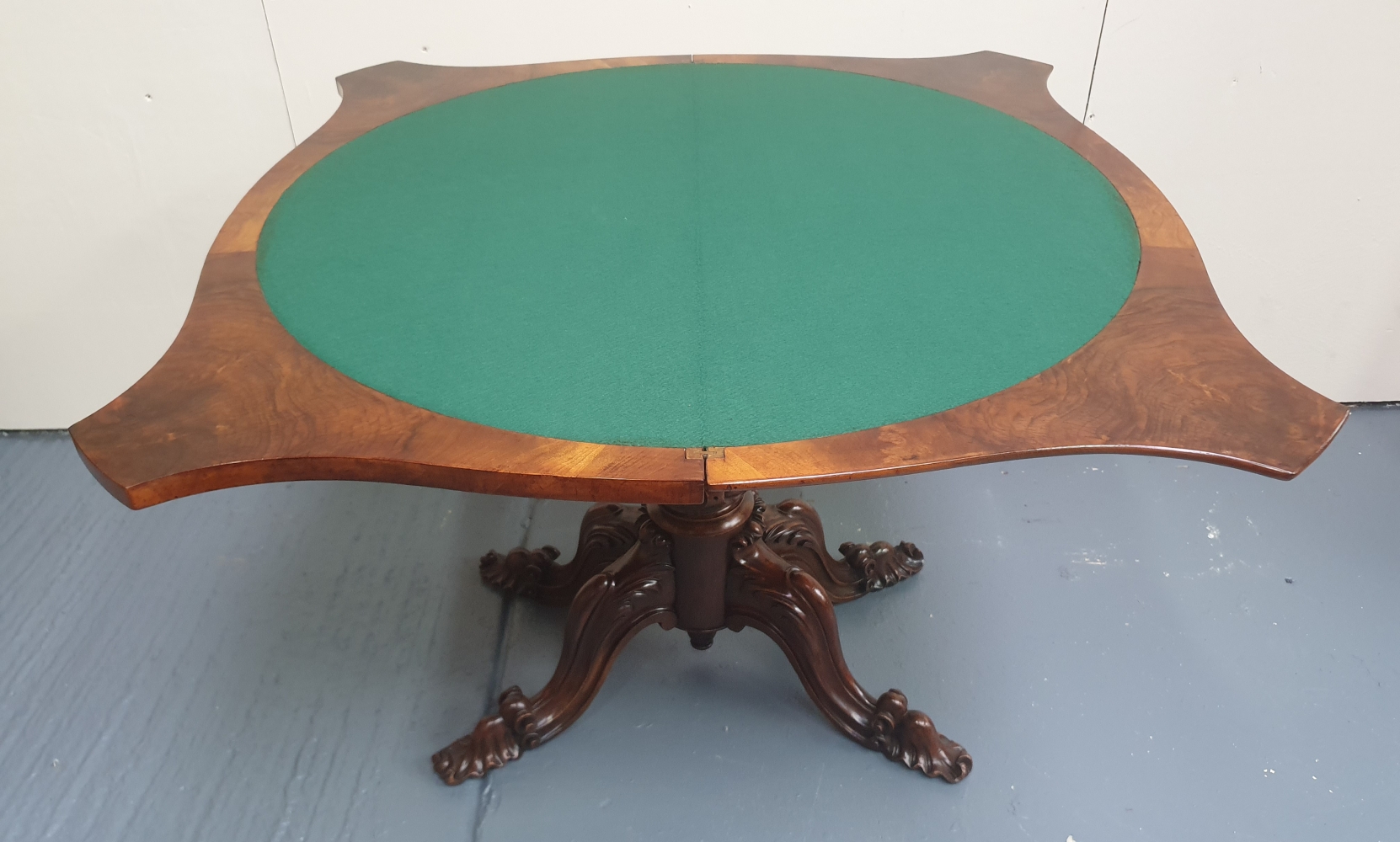 A VERY FINE BURR WALNUT 19TH CENTURY FOLD OVER CARD TABLE, with shaped top, raised on a carved - Image 4 of 4