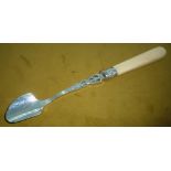 A LATE 19TH CENTURY SILVER STILTON SCOOP, with pierced decorated stem and ivory handle, London 1892