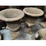 A PAIR OF COMPOSITION STONE GARDEN URNS IN THE CLASSICAL STYLE WITH TURNOVER LIP, 60cm high x 40cm