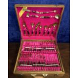 A 100 PIECE THAI CUTLERY SET IN WOODEN CASE, SIAM bronze, Maker Linsons Jewellery, Thailand, with