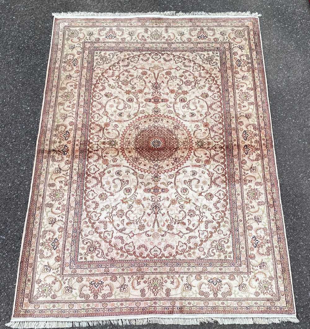 A HAND KNOTTED MONGOLIAN SILK PILE RUG, circa 1960s, with a knot density of around 130,000 knots per