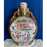 A CHINESE VASE, with gold dragon shaped handles, and decorated with images of figures and animals in