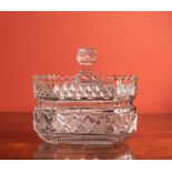 AN EARLY 19TH CENTURY IRISH COVERED BUTTER DISH, probably Waterford, 14cm
