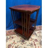 A REVOLVING BOOKCASE, Mahogany inlaid, with crossbanded top, on castor base, 54cm x 54cm x 84cm