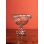 AN EARLY 19TH CENTURY IRISH FINELY CUT CENTRE BOWL, with turn over rim and square base, 16cm high,