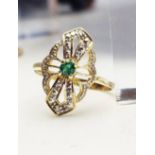 AN 18CT YELLOW GOLD EMERALD & DIAMOND MARQUISE RING, size L ½ , weight of ring 1.9grams