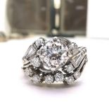 A FINE PLATINUM DIAMOND ART DECO CLUSTER / ENGAGEMENT / DRESS RING, with unusual shape and mix of