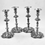 A SET OF FOUR GEORGE II 18TH CENTURY SILVER CANDLESTICKS, 1748, by William Holmes, Weight 2802g,