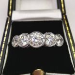 A STUNNING PLATINUM 5 STONE DIAMOND RING, 1.60ct diamond, size N, weight of ring 5.08grams