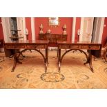 A FINE AND RARE PAIR OF GEORGE III MAHOGANY SOFA TABLES, with shaped cross stretcher, 72cm high x