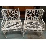 A PAIR OF 19TH CENTURY CAST IRON GARDEN SEATS IN THE GOTHIC STYLE, 24in wide x 36in high x 18in