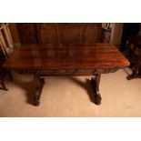 A FINE REGENCY ROSEWOOD LIBRARY TABLE, on column side pod supports and turned cross stretcher, c.