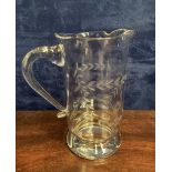 AN EDWARDIAN ENGRAVED AND CUT GLASS WATER JUG c.1910, 7 1/2in high