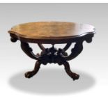 A 19TH CENTURY WALNUT OVAL BREAKFAST TABLE, on four shoot pod, burr walnut, with serpentine top,