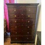 A GEORGIAN MAHOGANY TALLBOY, with 7 drawers standing on bracket feet with brass strap handles, 183cm