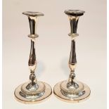 A PAIR OF SILVER PLATED CANDLE STICKS, 11" tall each