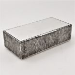 A 20TH CENTURY SILVER BOX by Gerald Benney, London, 1981, with hinged lid and typical textured body,