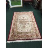 A VERY FINE PERSIAN SILK ‘QUM’ RUG, a rare commissioned piece, from a family of the ‘Noori’ Clan,