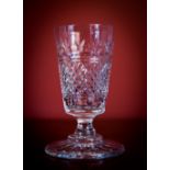 A 19TH CENTURY SHIP DRINKING GLASS, splendidly cut with heavy base, 7in high