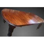 A SUPERB IRISH 19TH CENTURY DINING TABLE ON TURNED AND FLUTED LEG, with original leaves, seats