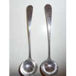 A LATE 19TH CENTURY PAIR OF SCOTTISH SILVER SAUCE LADLES, Glasgow, 1896, with engraved initials to