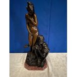 A LARGE BRONZE FIGURE OF A WOMAN WITH A MAN SITTING DOWN, impressed name to marble base, 68cm high