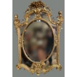 A VERY FINE & ORNATE VICTORIAN GILT WALL MIRROR, multiple pane mirror, the top is decorated with