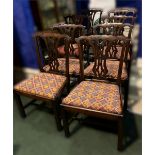 A SET OF EIGHT IRISH GEORGIAN MAHOGANY DINING CHAIRS, with pierce carved back splats and slip seats,