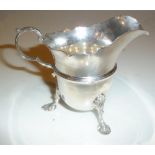 AN EARLY 20TH CENTURY SILVER CREAM JUG, Chester, 1903, maker: Stokes & Ireland, with scalloped