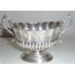 A LATE 19TH CENTURY TWO HANDLED SILVER CENTRE BOWL, Birmingham, 1894, with scalloped rim and half