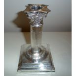 AN EARLY 20TH CENTURY SILVER CORINTHIAN STYLE CANDLESTICK, London, 1915, 5 Inches high, 4 Inch