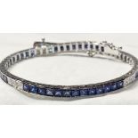 A STAR JEWELLERY LOT: A STUNNING 18CT WHITE GOLD NATURAL CEYLON SAPPHIRE & DIAMOND LINE BRACELET,