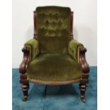 A 19TH CENTURY SOLID MAHOGANY FRAMED LIBRARY CHAIR, with button back and sides, raised on turned and