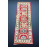 A FINE AFGHANISTAN KAZAK RUG, Bamiyan Valley Central Afghanistan, hand woven by Turkmen tribe