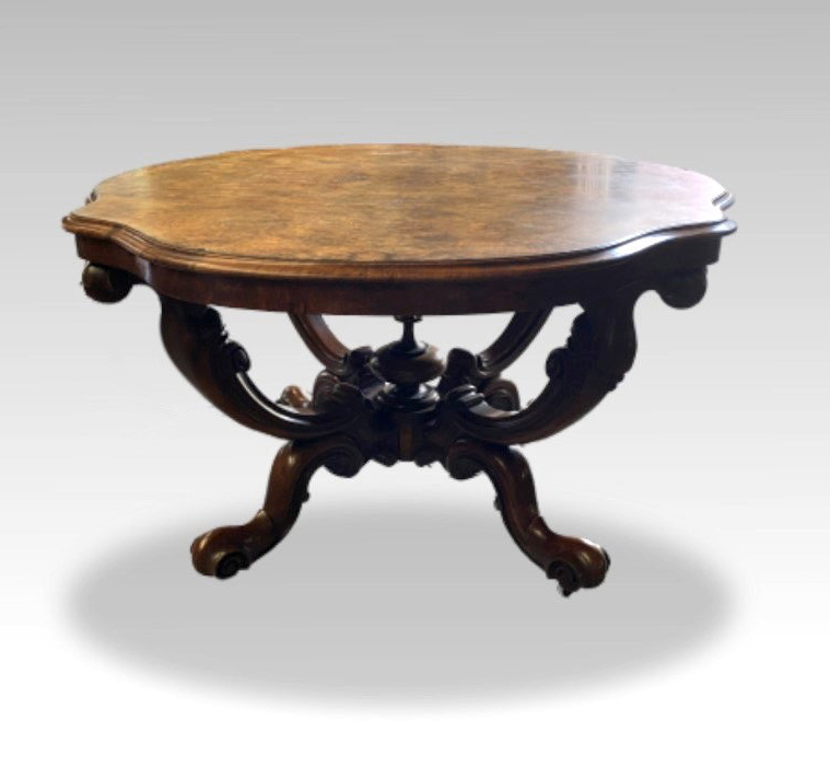 A 19TH CENTURY WALNUT OVAL BREAKFAST TABLE, on four shoot pod, burr walnut, with serpentine top,