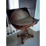 A WILLIAM IV ROSEWOOD CARD TABLE WITH ORIGINAL TOOLED BASE, with leaf and scroll carving supported