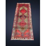 A PERSIAN HAMADAN RUNNER RUG, Hamadan Province Iran, c.1960, hand woven by Turkik weavers over