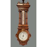 A GOOD QUALITY LATE 19TH / EARLY 20TH CENTURY OAK CARVED WALL BAROMETER, with carved Corinthian