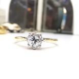AN 18CT DIAMOND SOLITAIRE RING, fully hallmarked, bright round brilliant cut diamond, solid gold