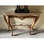 A 20TH CENTURY SERPENTINE SHAPED MARBLE TOPPED CONSOLE TABLE WITH CABRIOLE LEG, 40in wide x 27in