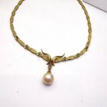 AN ANTIQUE 18CT SOLID GOLD EMERALD AND PEARL DROP NECKLACE, 18k solid gold with seven round cut 18ct