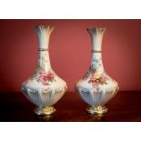 A PAIR OF EDWARDIAN ROYAL WORCESTER FINELY PAINTED VASES, dated 1911, 10.75in high