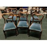 A SET OF SIX EARLY 19TH CENTURY SOLID ROSEWOOD DINING ROOM CHAIRS on fluted and turned legs, 84cm