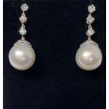 A PAIR OF 18CT SOUTH SEA PEARL & DIAMOND DROP EARRINGS, 1.25cts of diamond, this pair really are a