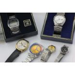 A Seiko digital dual chronograph bracelet watch, a Seiko automatic day and date watch, and four