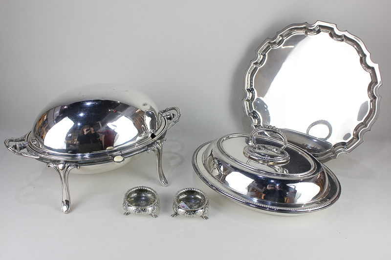 A silver plated oval revolving breakfast tureen, a Walker & Hall oval entree dish, an Arthur Price